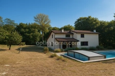  Maison d’architecte avec studio indépendant et vaste terrain boisé de 4 hectares