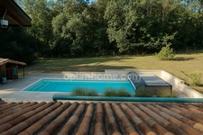  Maison d’architecte avec studio indépendant et vaste terrain boisé de 4 hectares