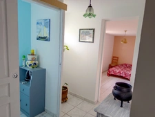 Villa d'environ 112 M2, proche commerces, jardin devant pour 950 M2, puits, garage attenant de 30 M2