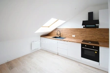 APPARTEMENT AU DEUXIEME ET DERNIER ETAGE - 2 CHAMBRES - PLACE PARKING - CAVE - 