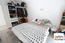 APPARTEMENT PLAIN PIED 50M2 ENVIRON - TERRASSE - PLACE DE PARKING PRIVATIVE - VENDU MEUBLE