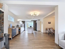 MAISON D’EXCEPTION 216 M² – 5 CHAMBRES + BUREAU – 2 SALLES DE BAIN – GARAGE 2 VOITURES – TERRAIN 2 146 M² – CALME ABSOLU ET VUE DÉGAGÉE