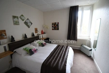 RARE OPPORTUNITÉ IMMOBILIÈRE À LONGUYON – ENSEMBLE DE 1 400 m² SUR PARC ARBORÉ DE 27 ARES ENVIRON