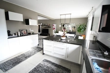 BELLE MAISON INDIVIDUELLE DE 120M2 ENVIRON - 4 CHAMBRES - GARAGE - TERRAIN DE PRESQUE 4 ARES