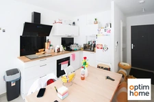 APPARTEMENT PLAIN PIED 50M2 ENVIRON - TERRASSE - PLACE DE PARKING PRIVATIVE - VENDU MEUBLE