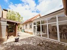 Maison de ville avec jardin, garage et potentiel d'évolution
