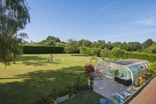 Maison familiale avec piscine à 5 minutes de Pont-l'Évêque – 225 m² – 5/6 chambres – Terrain de 4 000 m² - Garage et parking