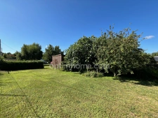 HONFLEUR - TERRAIN CONSTRUCTIBLE 702 m² AVEC GARAGE EXISTANT  – LIBRE DE CONSTRUCTEUR