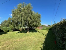 HONFLEUR - TERRAIN CONSTRUCTIBLE 702 m² AVEC GARAGE EXISTANT  – LIBRE DE CONSTRUCTEUR