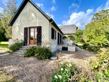 Agréable maison  - Secteur recherché - 4 Chambres - Grenier aménagé - Sous sol avec garage.