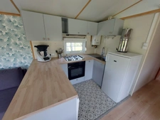 CORPS DE FERME AVEC DEPENDANCES ET GRAND MOBILHOME SUR TERRAIN SUR VEGETALISE DE 2ha16a90ca aux allures de camping! 250000€
