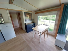 CORPS DE FERME AVEC DEPENDANCES ET GRAND MOBILHOME SUR TERRAIN SUR VEGETALISE DE 2ha16a90ca aux allures de camping! 250000€