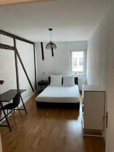 EXCLUSIF : Splendide Appartement Haussmannien en Duplex avec Rendement Locatif