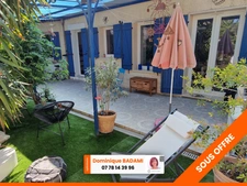 BEAUCOUP DE CACHET POUR CET APPARTEMENT AVEC JARDIN!
