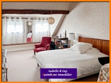 2 LOGEMENTS ET UN TERRAIN AVEC 2 BATIMENTS