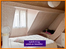 2 LOGEMENTS ET UN TERRAIN AVEC 2 BATIMENTS