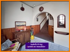2 LOGEMENTS ET UN TERRAIN AVEC 2 BATIMENTS
