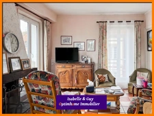 2 LOGEMENTS ET UN TERRAIN AVEC 2 BATIMENTS