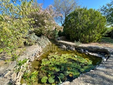 For sale – Property with panoramic view and stone outbuilding, 5 minutes from Uzès