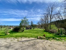 Between Uzès and La Roque-sur-Cèze, a Provençal Eden: 18th-century farmhouse & its private estate on 3.3 hectares