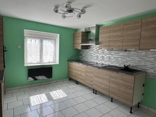 ENSEMBLE DE DEUX MAISONS DE VILLAGE RENOVÉES AVEC GARAGE ET JARDIN