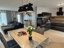 PAVILLON INDIVIDUEL SUR SOUS-SOL SEMI-ENTERRÉ