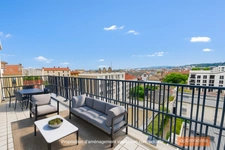 Très beau T2 en dernier étage avec grand séjour et terrasse à ciel ouvert
