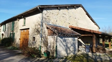 Maison à vendre à la campagne de 185 m² avec 4 chambres; balcon, grange et terrain. 