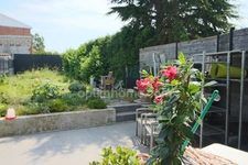 Hem proche centre - Local commercial de 147 m² avec réserve, bureaux et jardin – Emplacement visible 