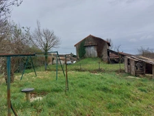 ENSEMBLE IMMOBILIER DE 2 MAISONS EN PIERRE  A RENOVER  PLUS UNE GRANGE FERMEE AVEC TOITURE NEUVE SUR PARCELLE AGRICOLE DE 8087M² CARMAUX (81)