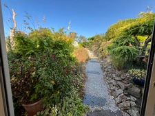 À seulement 5 km de Barneville-Carteret, charmante maison en pierre avec jardin arboré