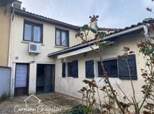 Maison cœur de ville de 95m², 4 chambres, garage, jardin, dépendances 