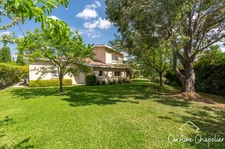 Maison de 200m², 4 chambres, bureau, 2 SDB, 3 WC, double garage, jardin piscinable. 