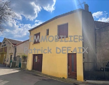 Maison 2 chambres et garage.