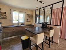 Villa de plain pied 94 m² -  3 chambres -  garage -  jardin à Vertaizon 63