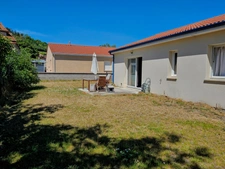 Villa de plain pied 94 m² -  3 chambres -  garage -  jardin à Vertaizon 63
