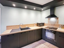 Maison d'habitation + studio + local commercial 
