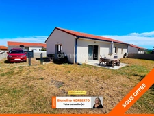 Villa de plain pied 94 m² -  3 chambres -  garage -  jardin à Vertaizon 63
