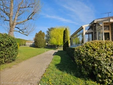 Maison 4 pièces -3 chambres- plusieurs garages -Beau terrain  2000 m2 - PERIGNAT LES SARLIEVE (63)