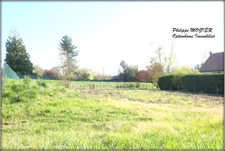 Abrest, terrain constructible de 1413 m2. 