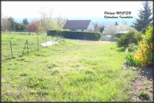 Abrest, terrain constructible de 1413 m2. 
