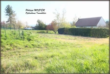 Abrest, terrain constructible de 1413 m2. 
