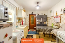 Maison Jumelée avec garage et jardin clos