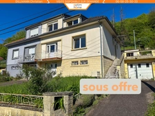 Maison jumelée d'un coté
