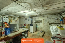 Maison Jumelée avec garage et jardin clos