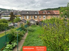 Maison Jumelée avec garage et jardin clos