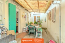 Maison Jumelée avec garage et jardin clos