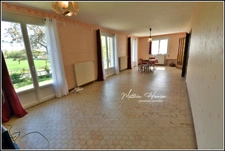 Maison familiale 4 chambres avec vie de plain-pied, sous-sol total et jardin de 1 380 m²