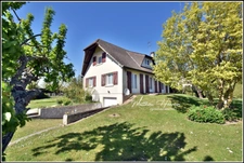 Maison familiale 4 chambres avec vie de plain-pied, sous-sol total et jardin de 1 380 m²
