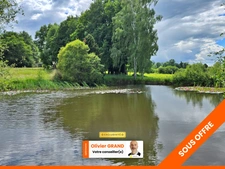 TERRAIN DE LOISIR AVEC ETANG - PRAIRIE ET BATIMENT - ENVIRONNEMENT CALME ET CAMPAGNE